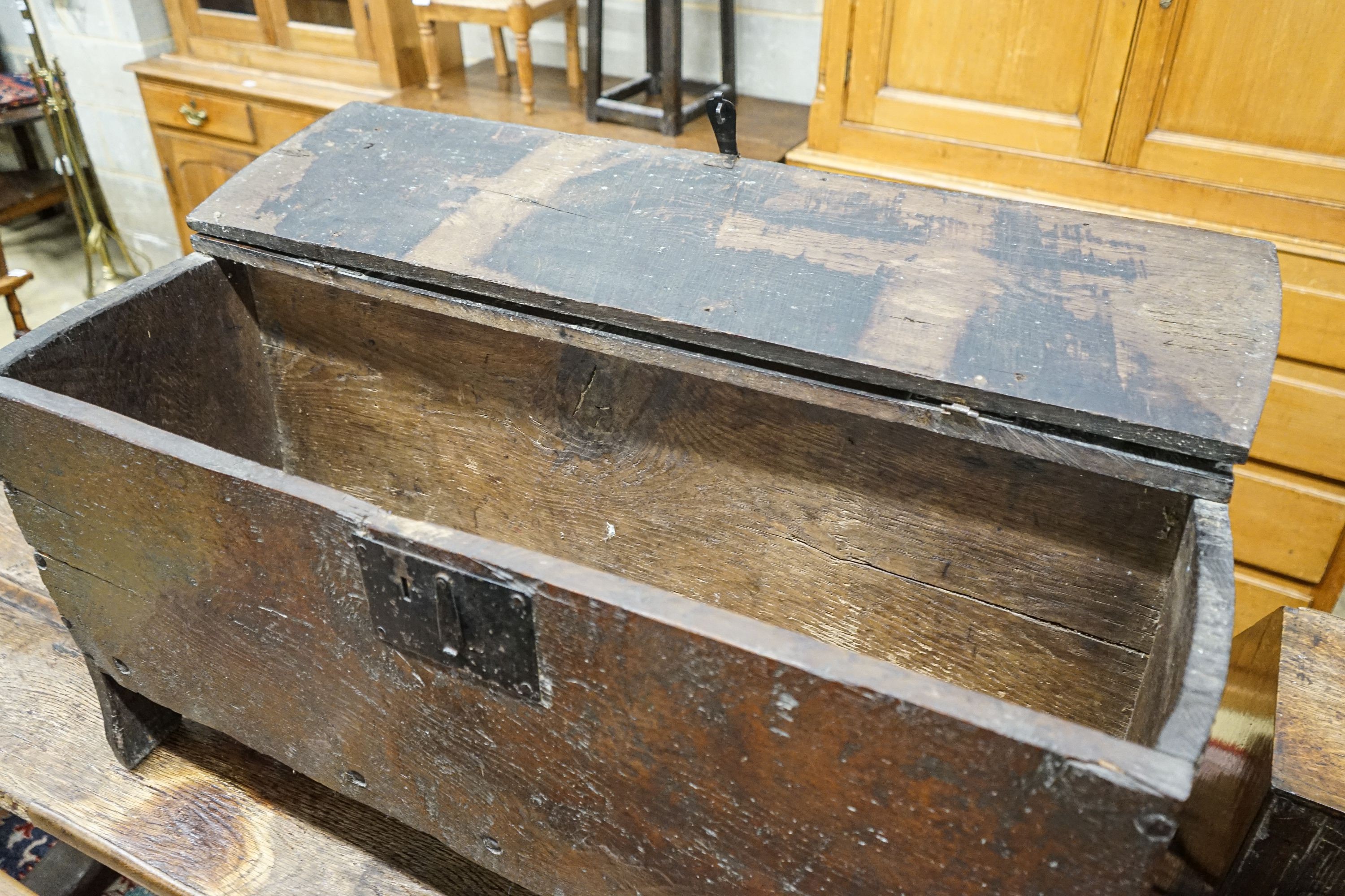 A 17th century oak and elm six plank coffer, width 104cm, depth 36cm, height 54cm